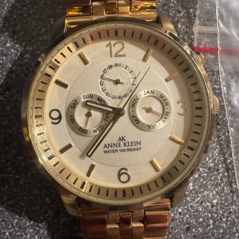 Anne Klein Gold Tone Cream Dial Multi-Function Bracelet Watch